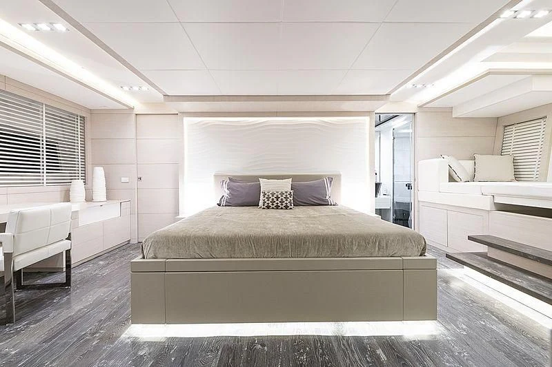 a large bedroom with a bed aboard SEAFIRE Yacht for Sale
