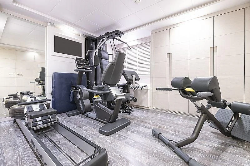 a gym with exercise equipment aboard SEAFIRE Yacht for Sale