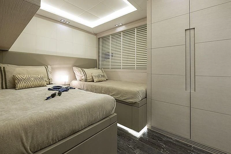 a couple of beds in a room aboard SEAFIRE Yacht for Sale