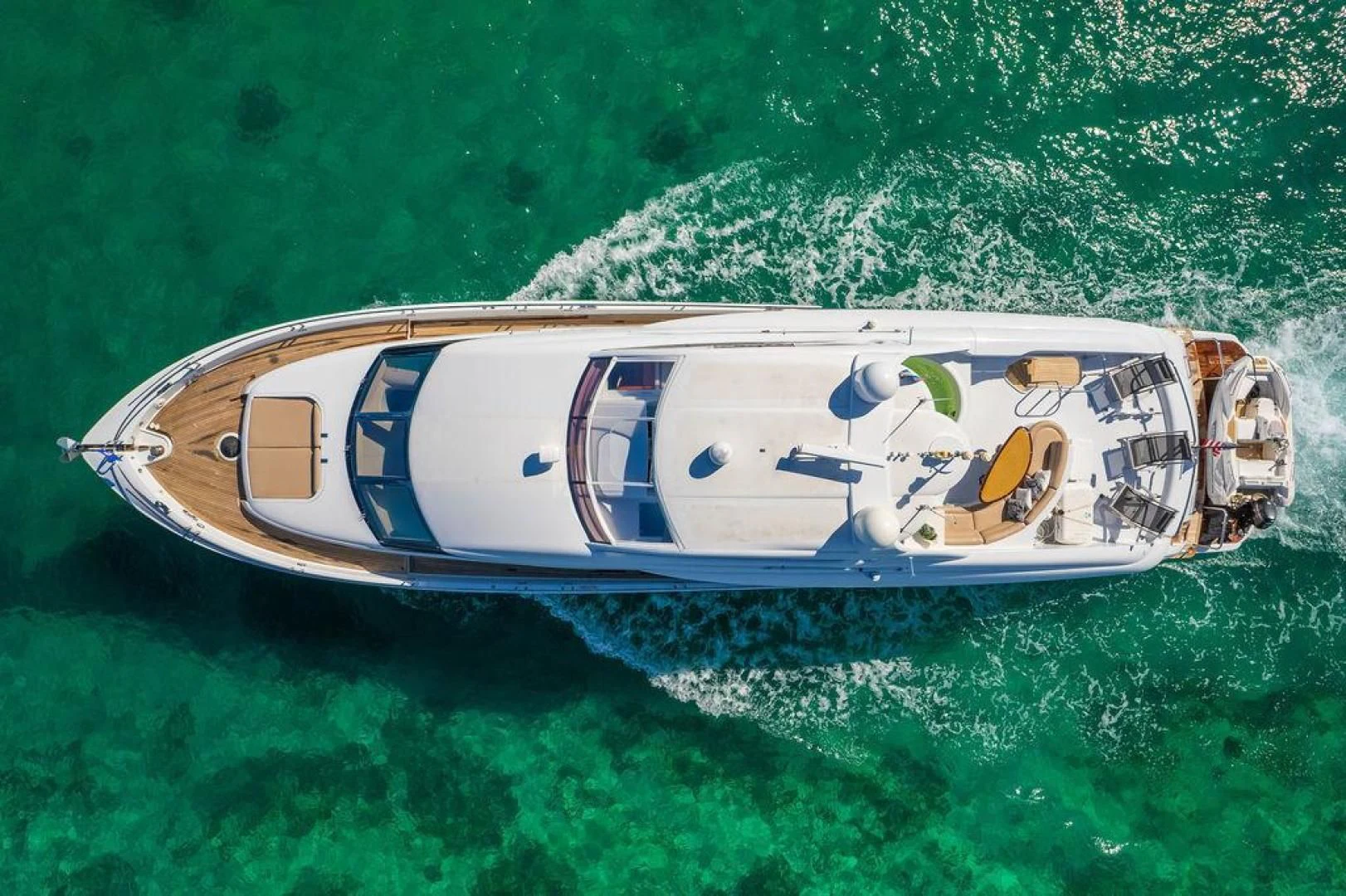 a car with a lot of logos on it aboard CHIP Yacht for Sale