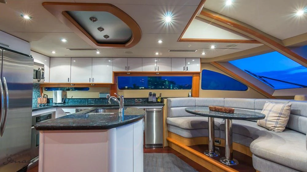 a kitchen with a large island aboard CHIP Yacht for Sale