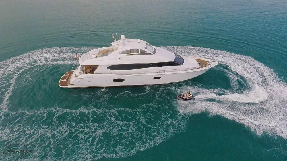 a white yacht in the ocean aboard CHIP Yacht for Sale