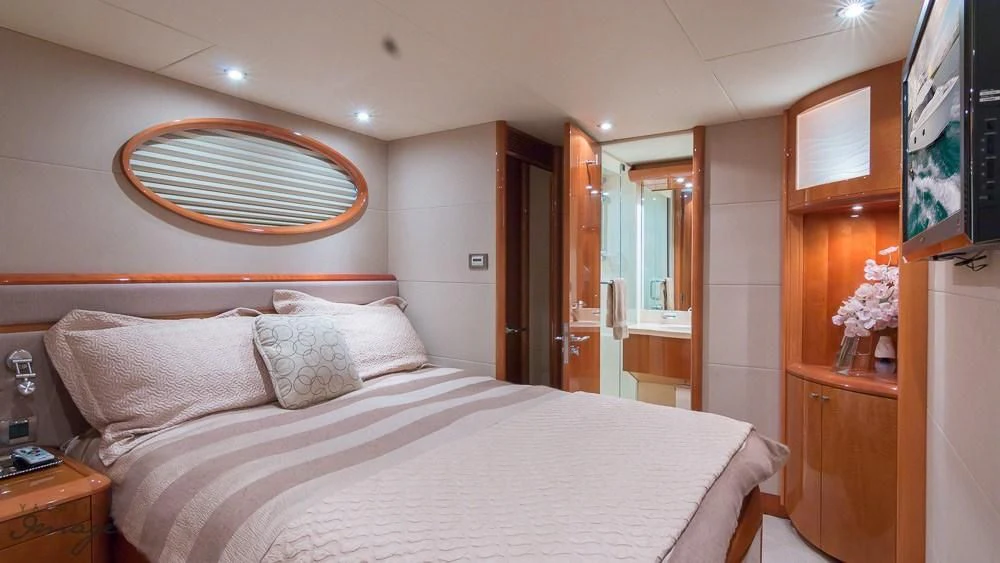 a bed in a room aboard CHIP Yacht for Sale