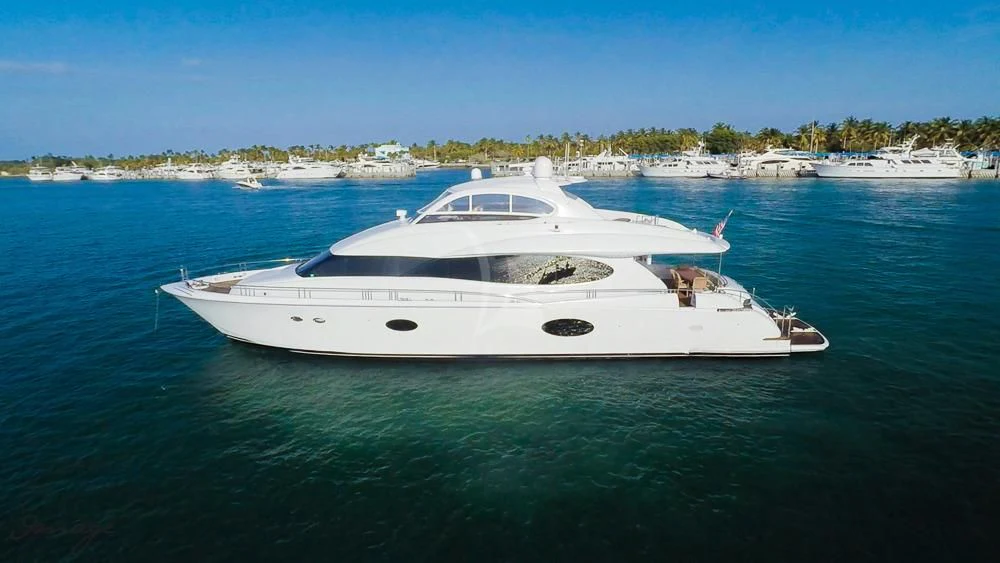 a white yacht in the water aboard CHIP Yacht for Sale