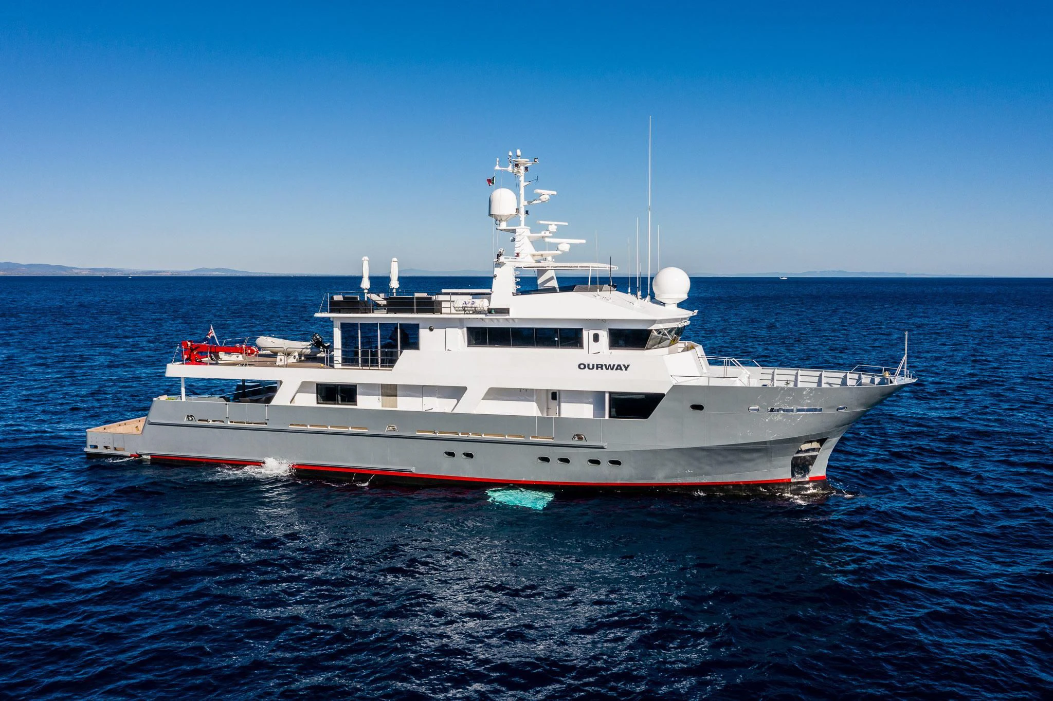 a large white boat in the water aboard OURWAY Yacht for Sale