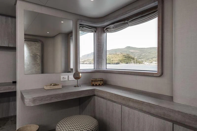 a bathroom with a large window aboard OURWAY Yacht for Sale
