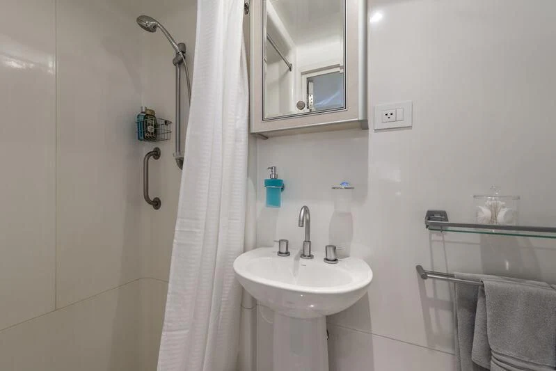 a bathroom with a sink and a shower aboard OURWAY Yacht for Sale