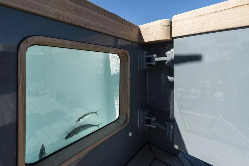 a plane window with a plane aboard OURWAY Yacht for Sale