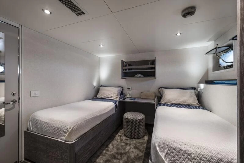 a room with two beds aboard OURWAY Yacht for Sale