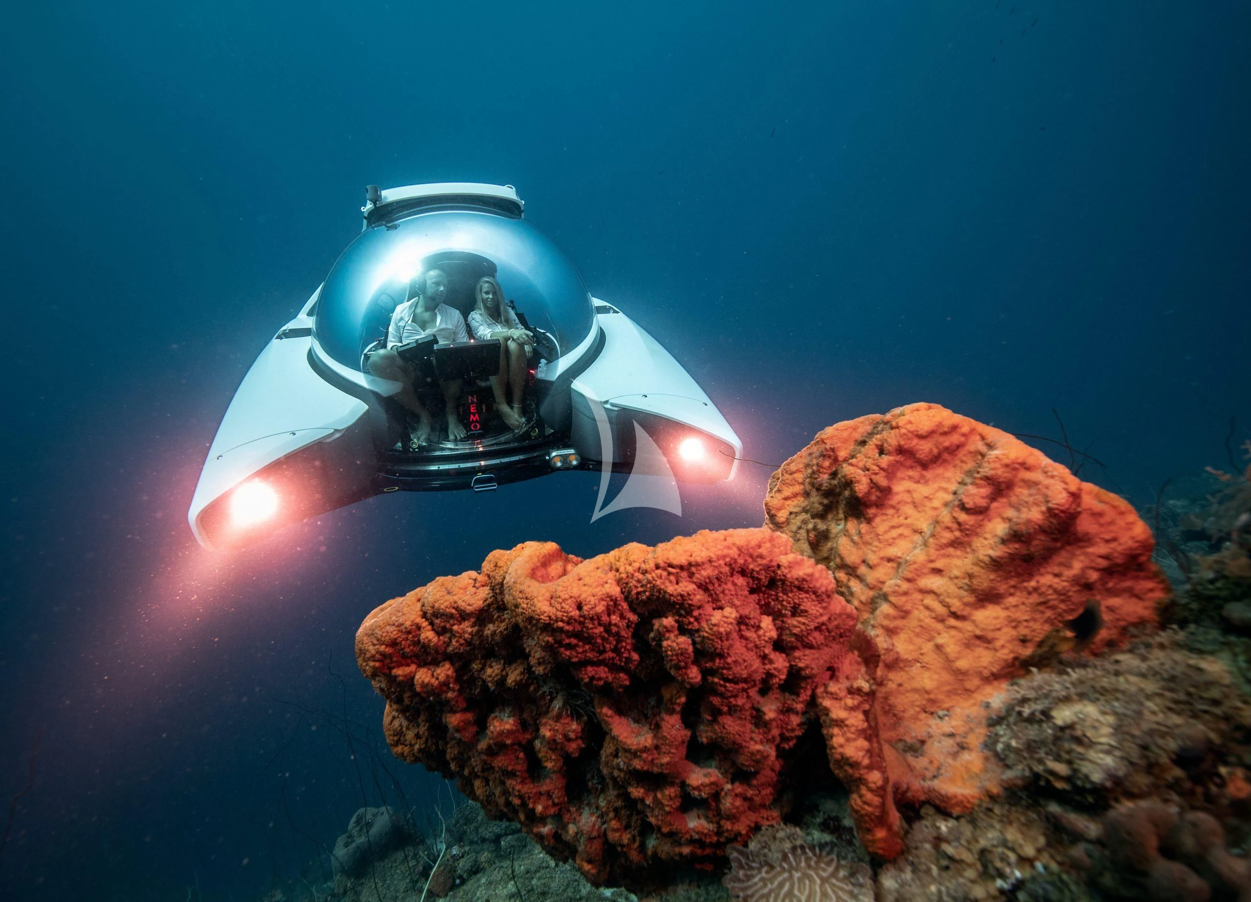 a scuba diver swimming in the water aboard OURWAY Yacht for Sale