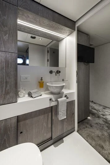 a bathroom with a sink and a toilet aboard OURWAY Yacht for Sale