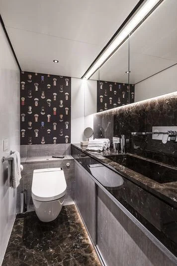 a bathroom with a toilet and sink aboard OURWAY Yacht for Sale