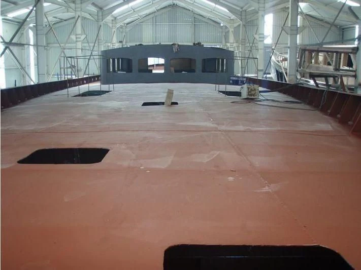 a large warehouse with a large floor aboard AGICA Yacht for Sale