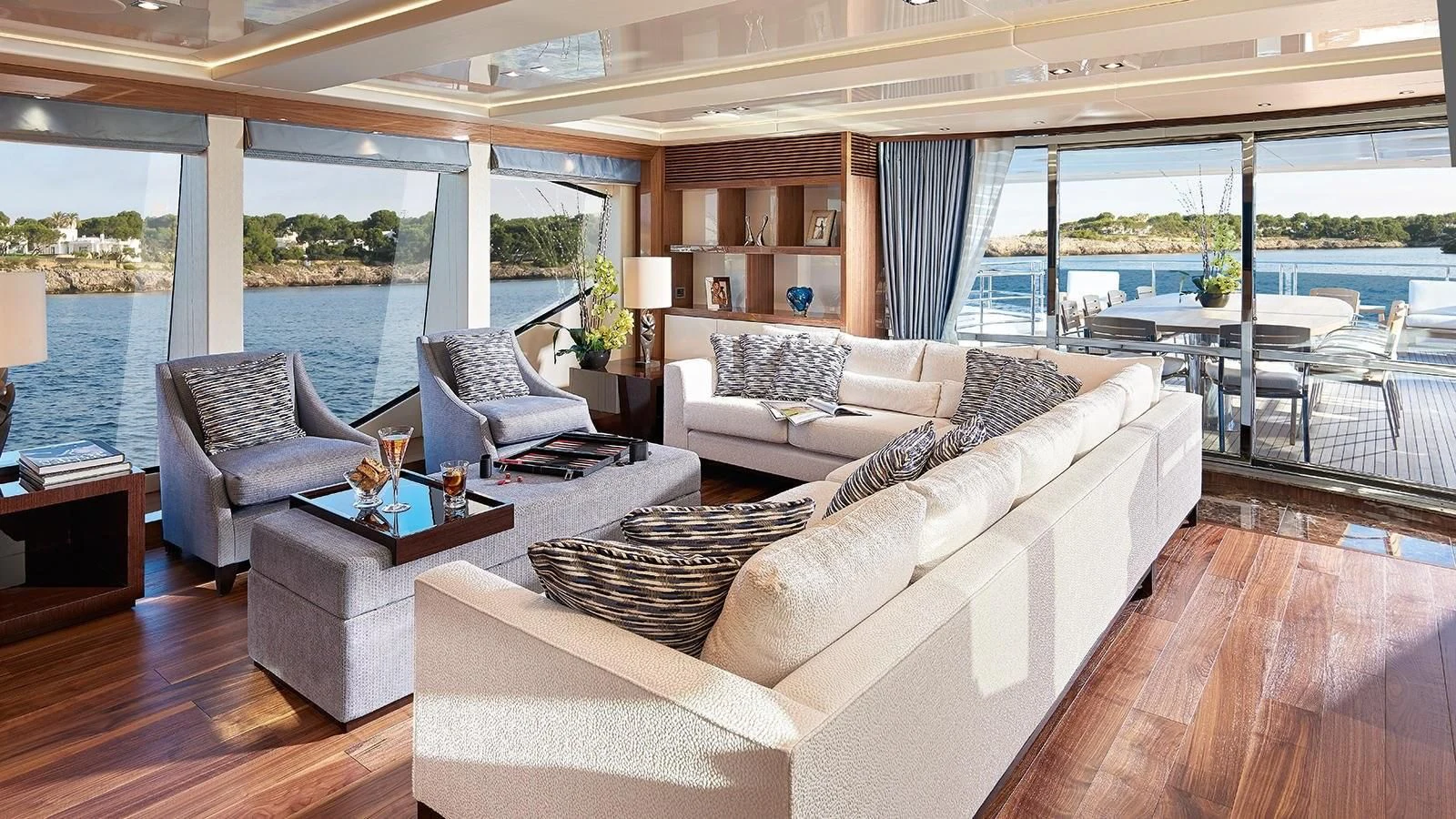 a living room with a large window aboard FANDANGO Yacht for Sale