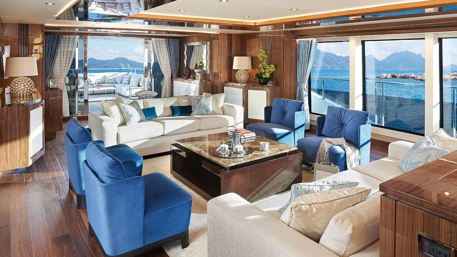 a living room with a large window aboard FANDANGO Yacht for Sale