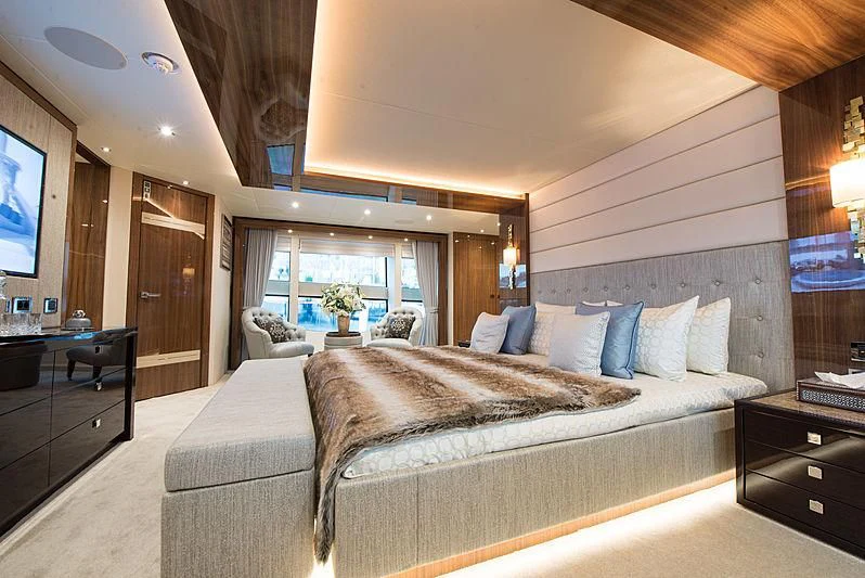 a large bed in a room aboard FANDANGO Yacht for Sale