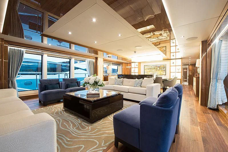 a living room with a large window aboard FANDANGO Yacht for Sale