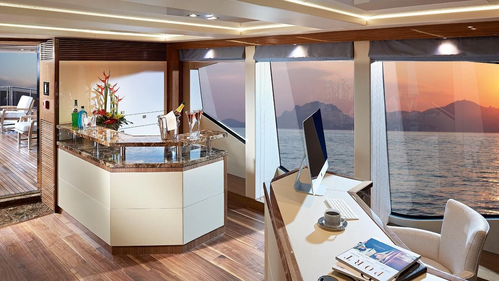 a room with a large window and a desk with a computer on it aboard FANDANGO Yacht for Sale