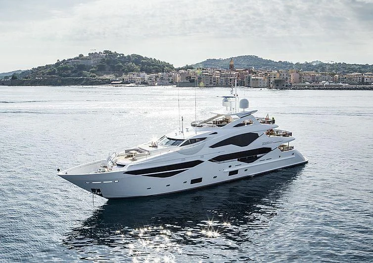 a white yacht in the water aboard FANDANGO Yacht for Sale