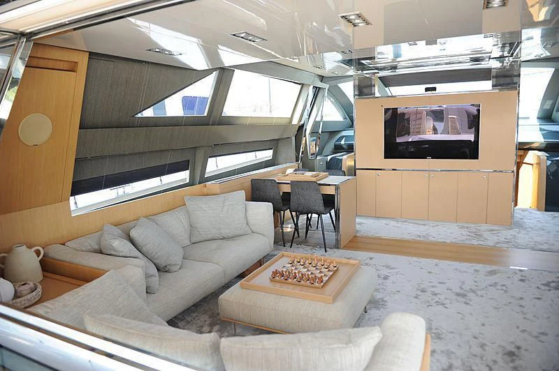 a living room with a couch and a tv aboard MY CHOICE Yacht for Sale
