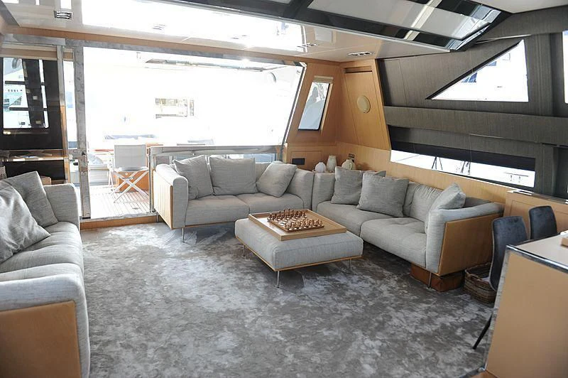 a living room with a couch and a table aboard MY CHOICE Yacht for Sale