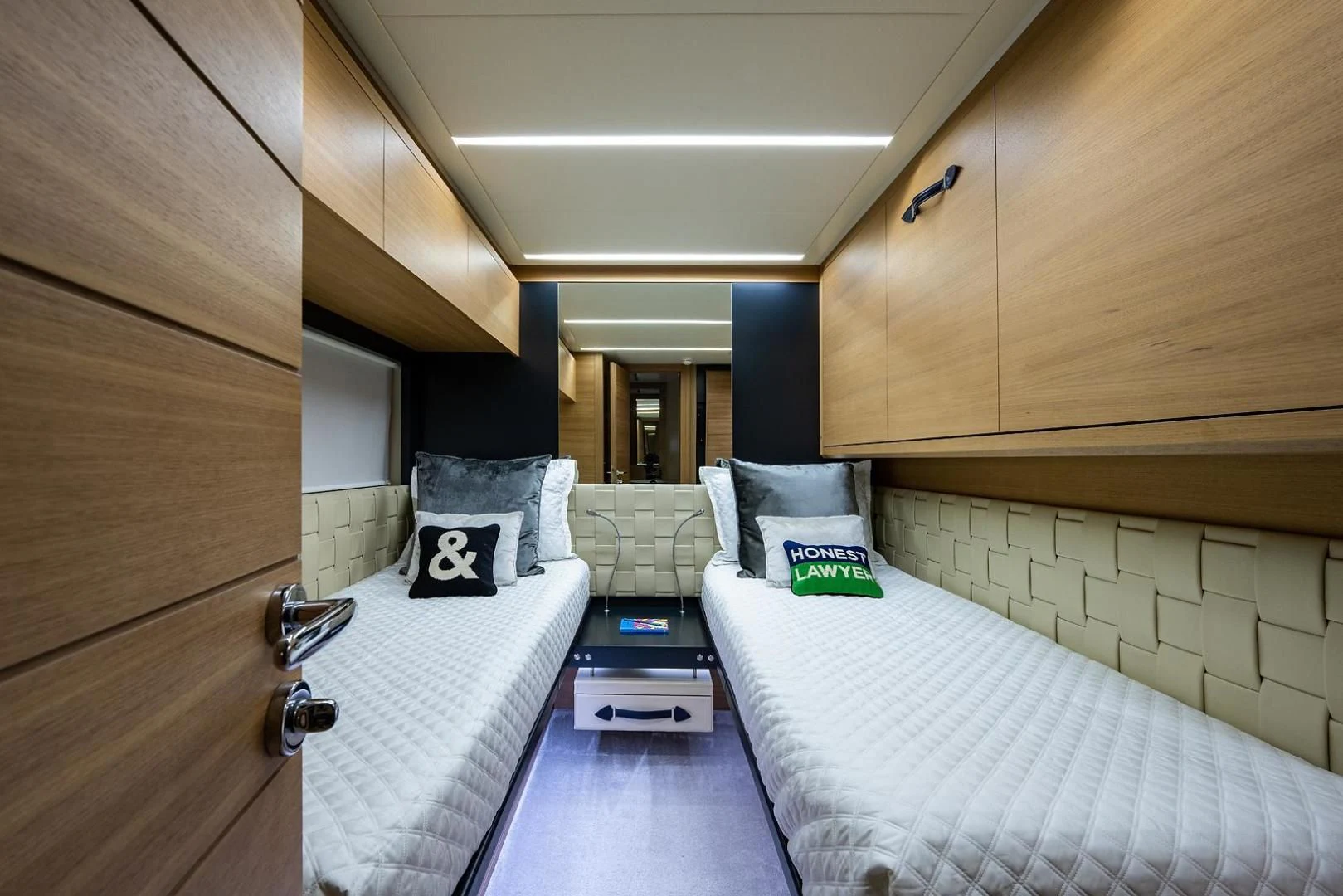 a room with two beds aboard CLAIMS TO FAME Yacht for Sale