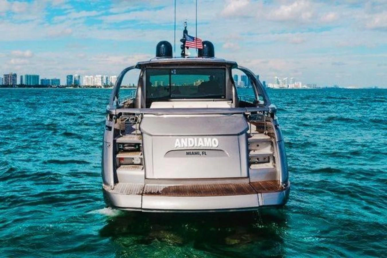 a car driving in the water aboard CLAIMS TO FAME Yacht for Sale