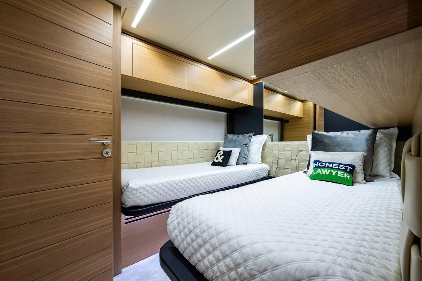a couple of beds in a room aboard CLAIMS TO FAME Yacht for Sale