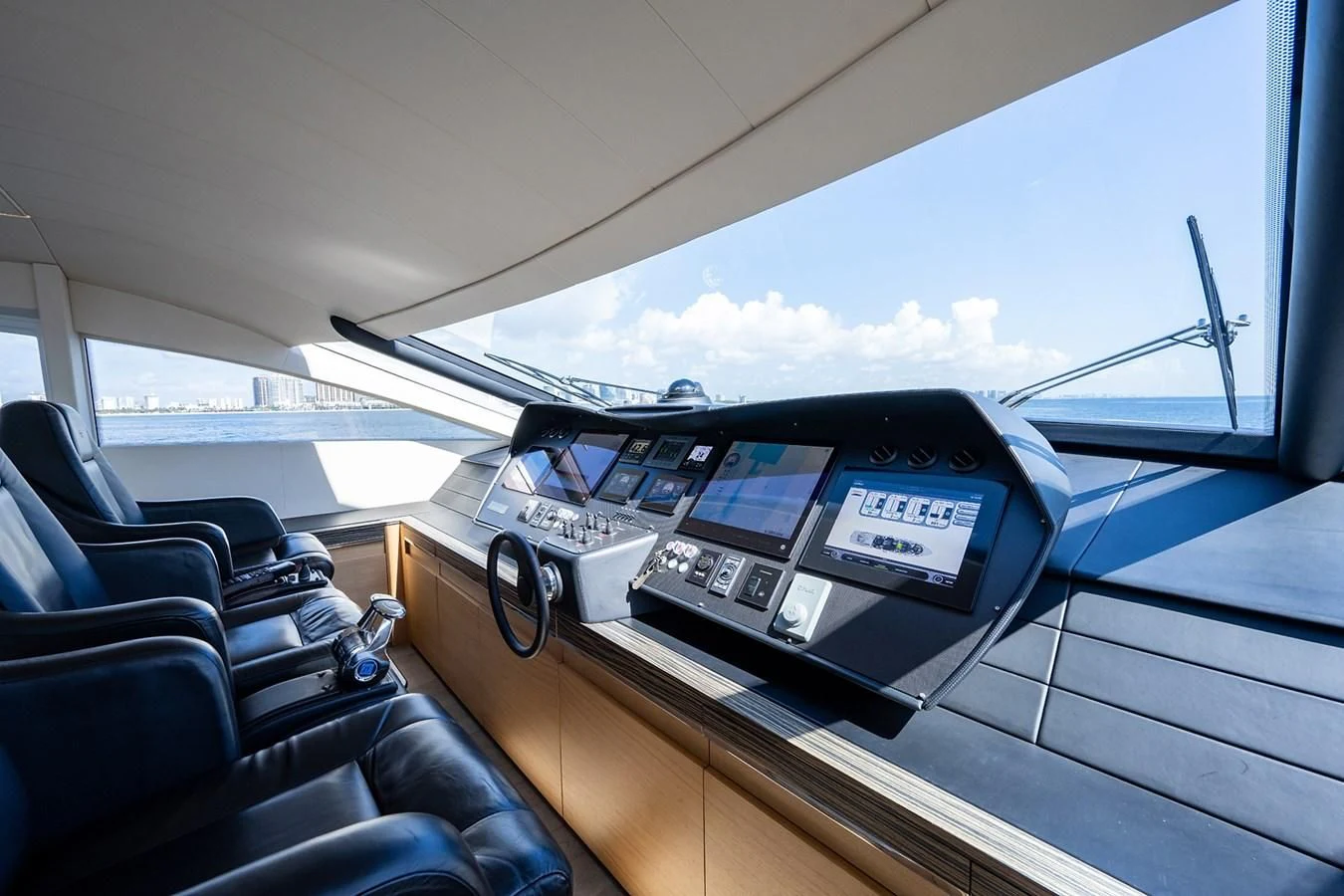inside of a car aboard CLAIMS TO FAME Yacht for Sale