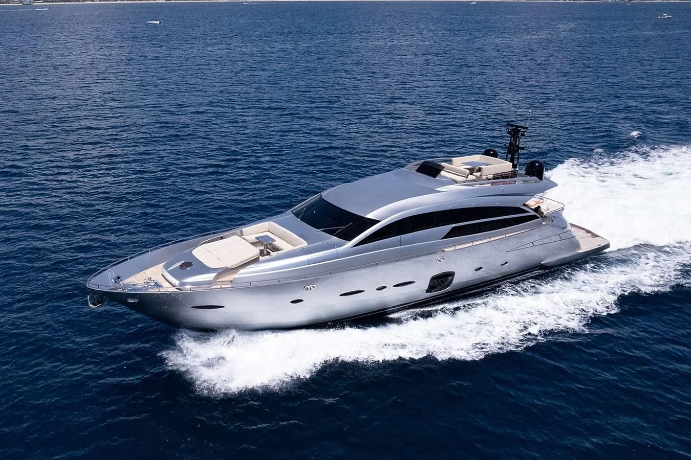 a white yacht on the water aboard CLAIMS TO FAME Yacht for Sale
