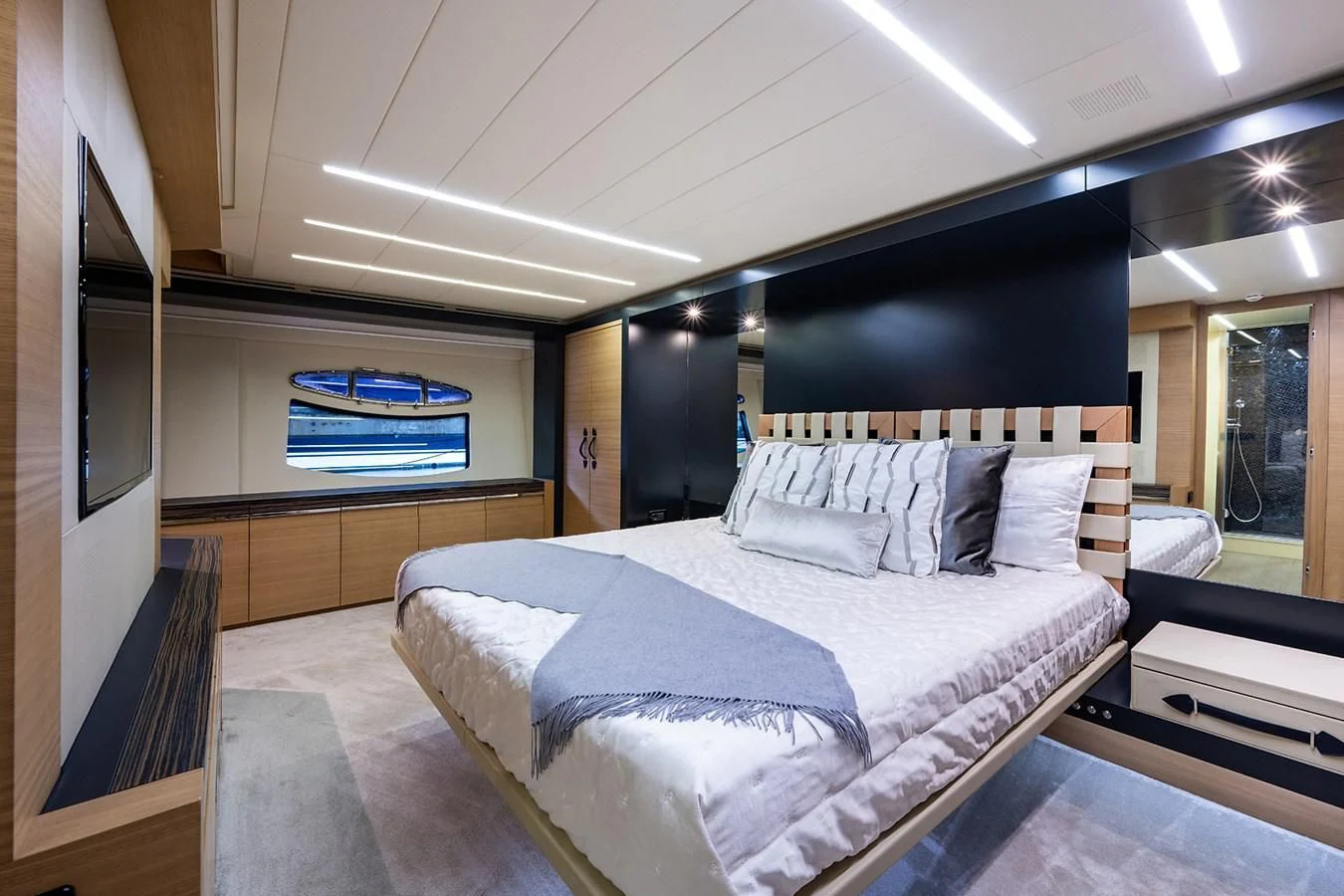 a bedroom with a bed aboard CLAIMS TO FAME Yacht for Sale