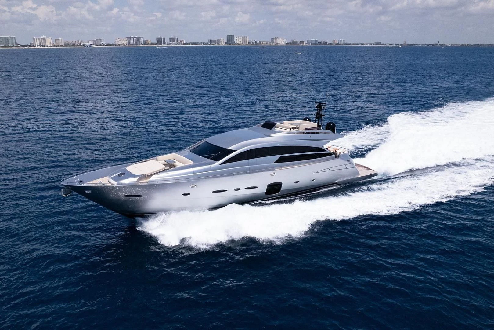 a white yacht on the water aboard CLAIMS TO FAME Yacht for Sale
