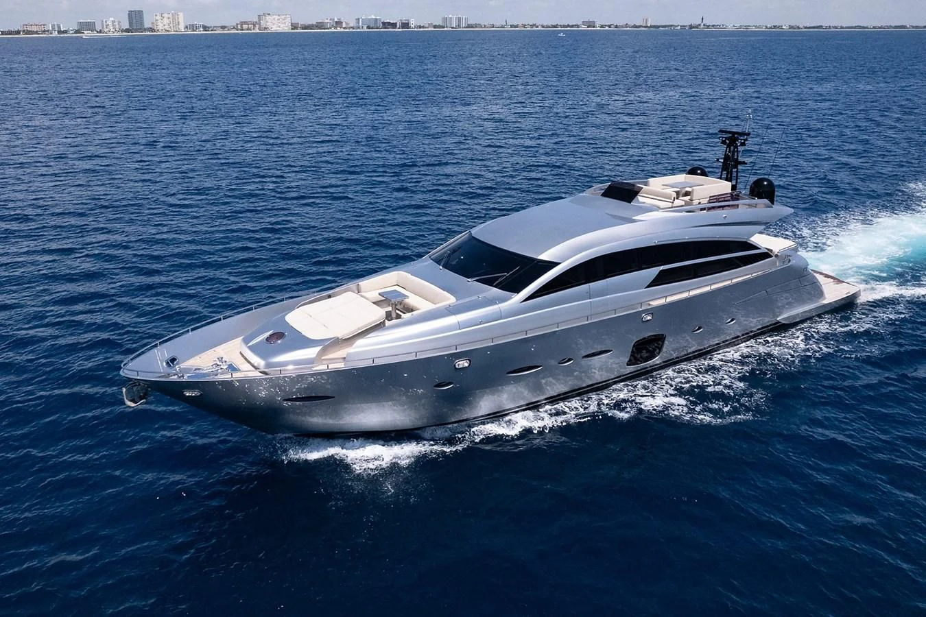 a white yacht on the water aboard CLAIMS TO FAME Yacht for Sale