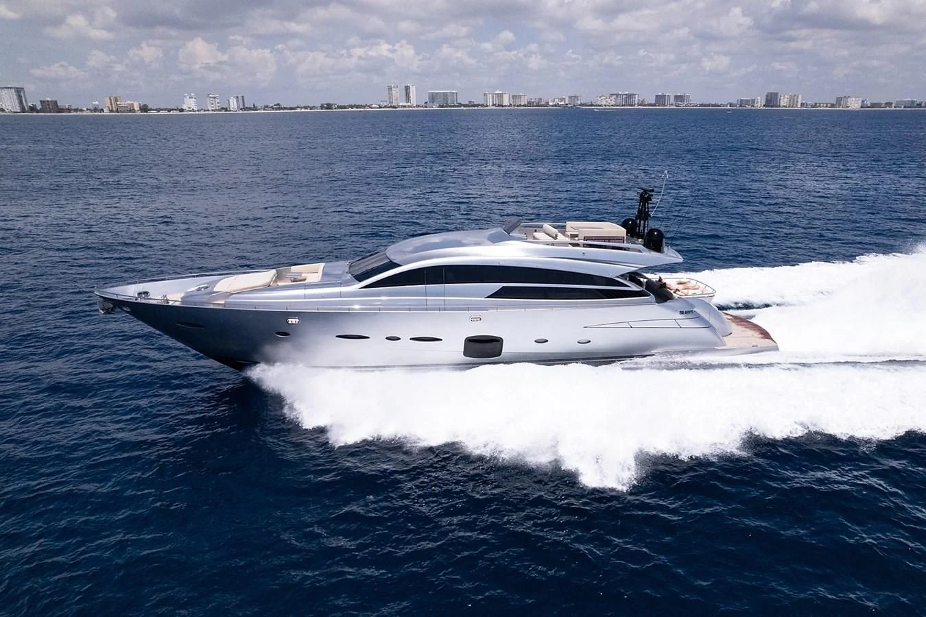 a white yacht in the water aboard CLAIMS TO FAME Yacht for Sale