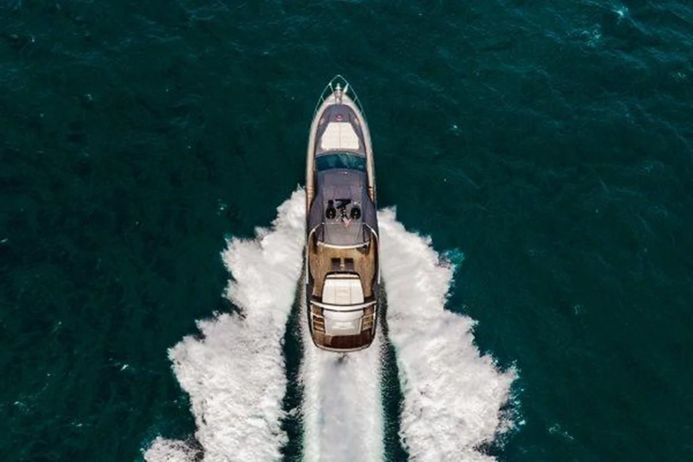 a boat on the water aboard CLAIMS TO FAME Yacht for Sale