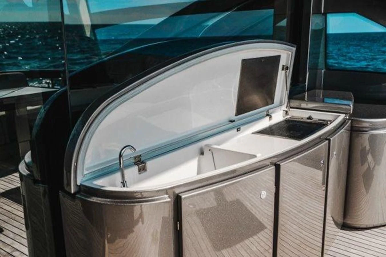 a white car with a hood aboard CLAIMS TO FAME Yacht for Sale