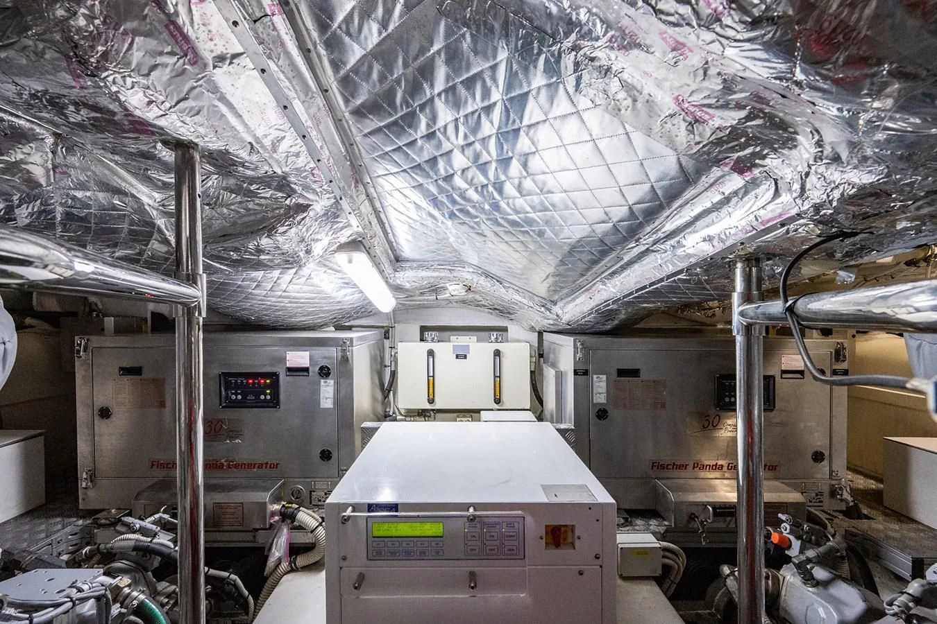 a room with machinery aboard CLAIMS TO FAME Yacht for Sale