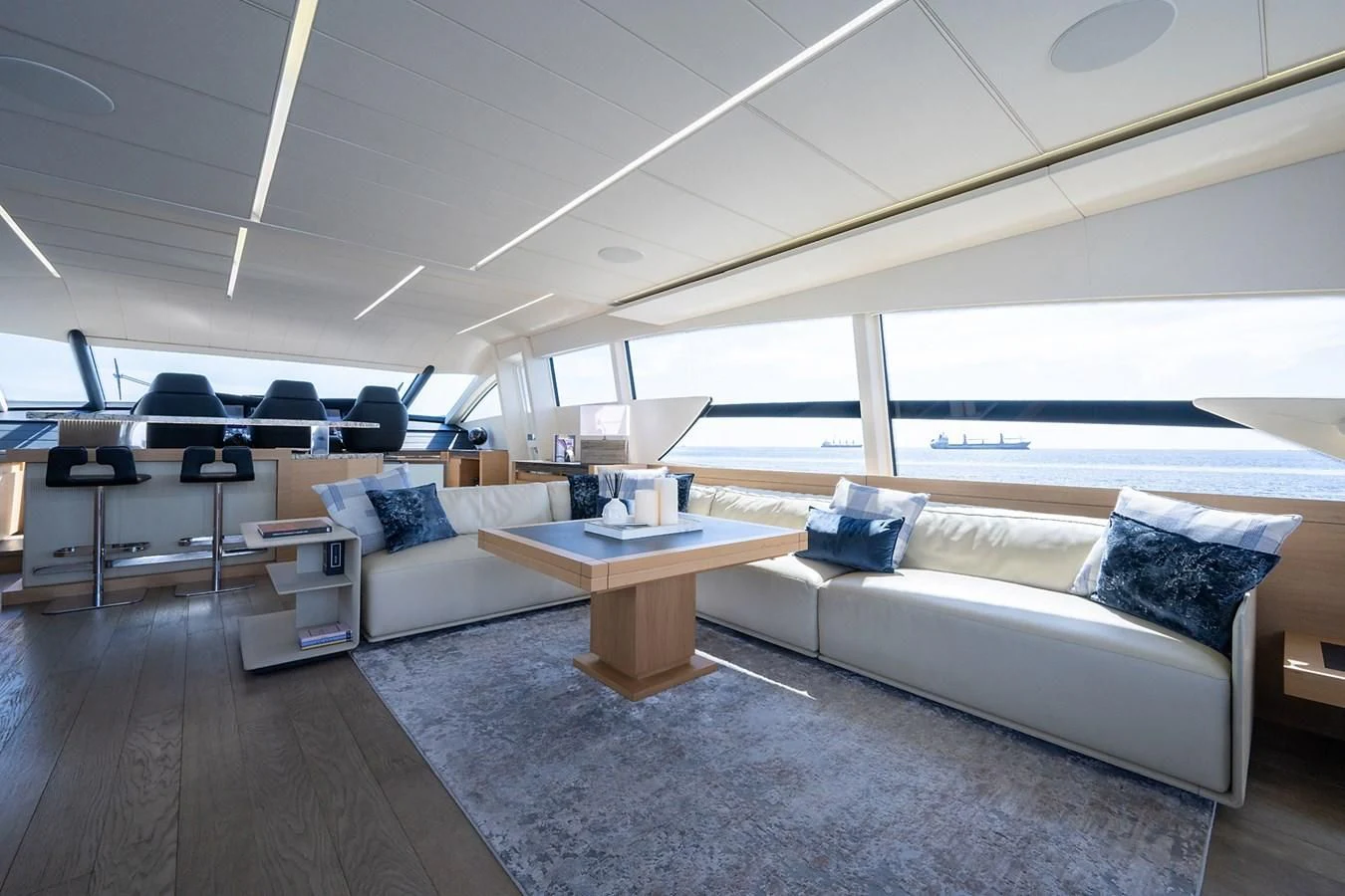 a room with a couch and a table aboard CLAIMS TO FAME Yacht for Sale