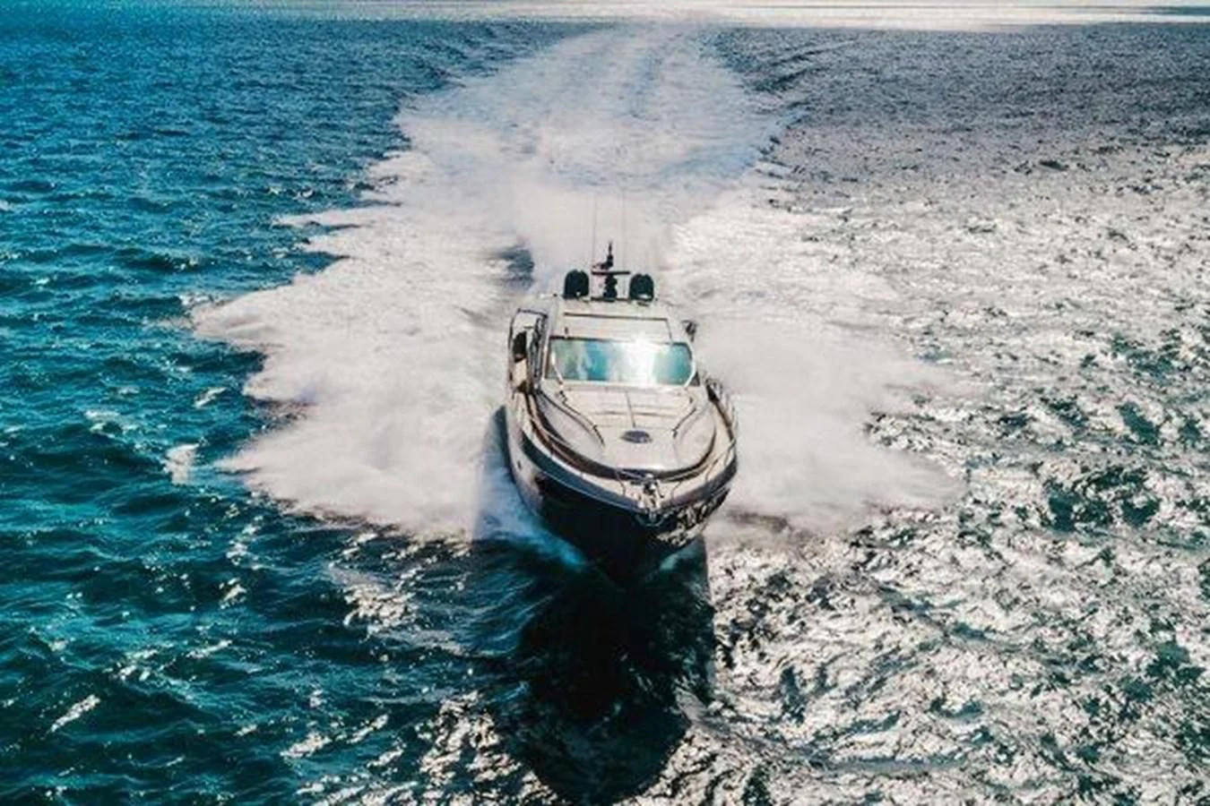 a boat on the water aboard CLAIMS TO FAME Yacht for Sale