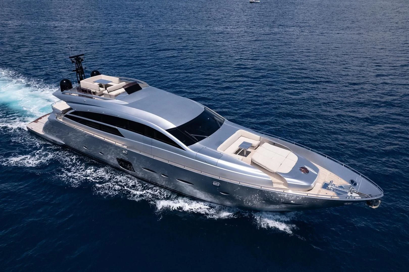 a white yacht on the water aboard CLAIMS TO FAME Yacht for Sale