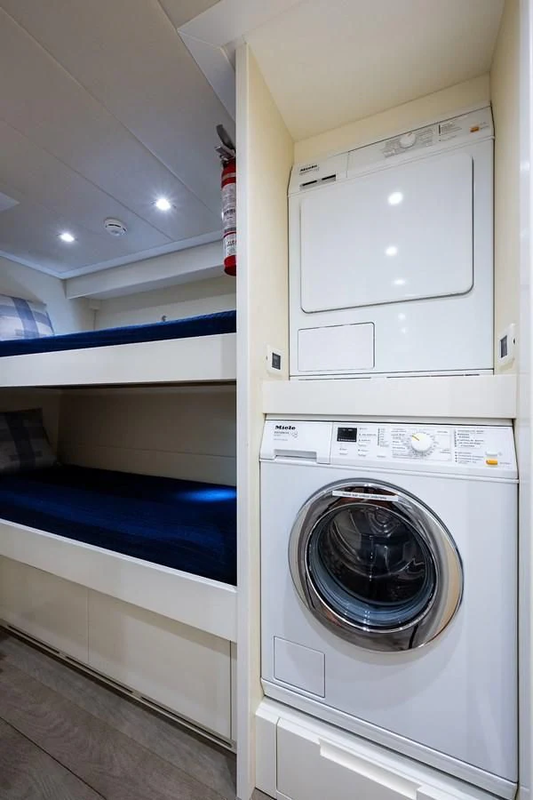 a white washing machine aboard CLAIMS TO FAME Yacht for Sale