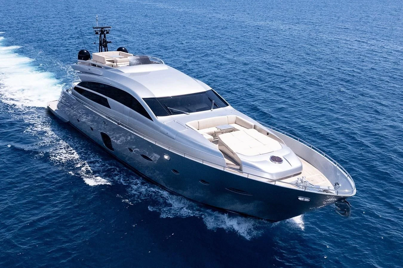a white yacht in the water aboard CLAIMS TO FAME Yacht for Sale