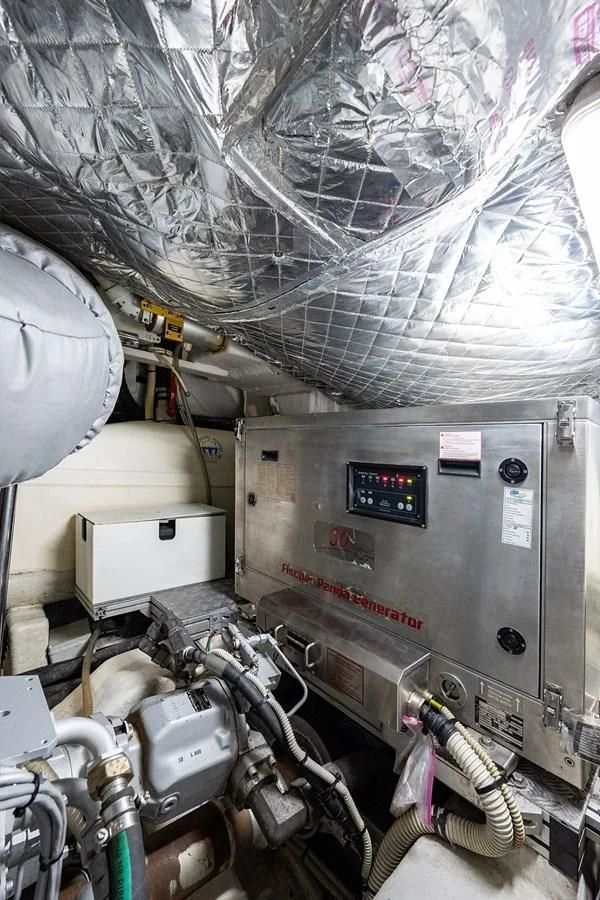 a large machine with a screen aboard CLAIMS TO FAME Yacht for Sale