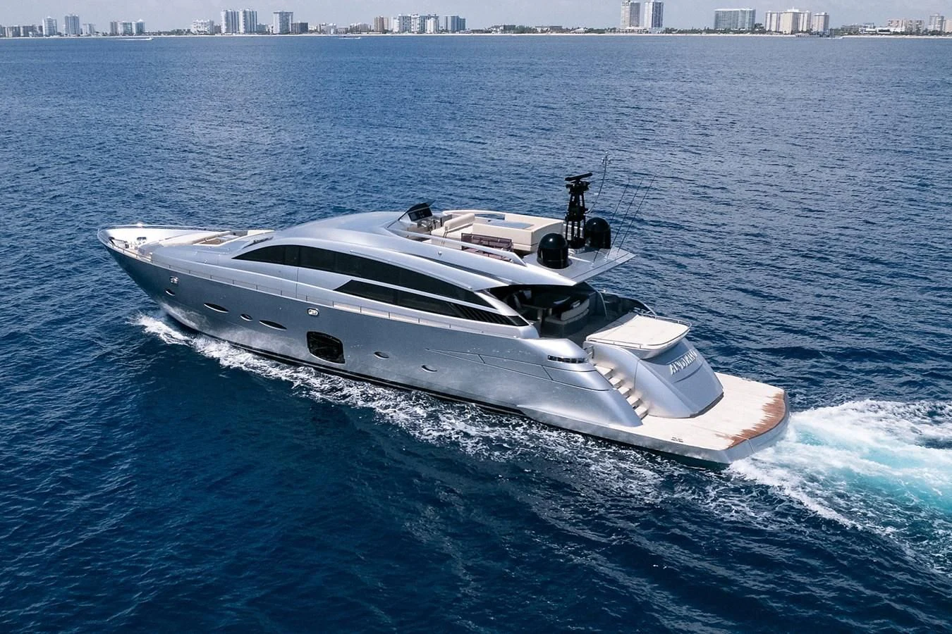 a white yacht on the water aboard CLAIMS TO FAME Yacht for Sale