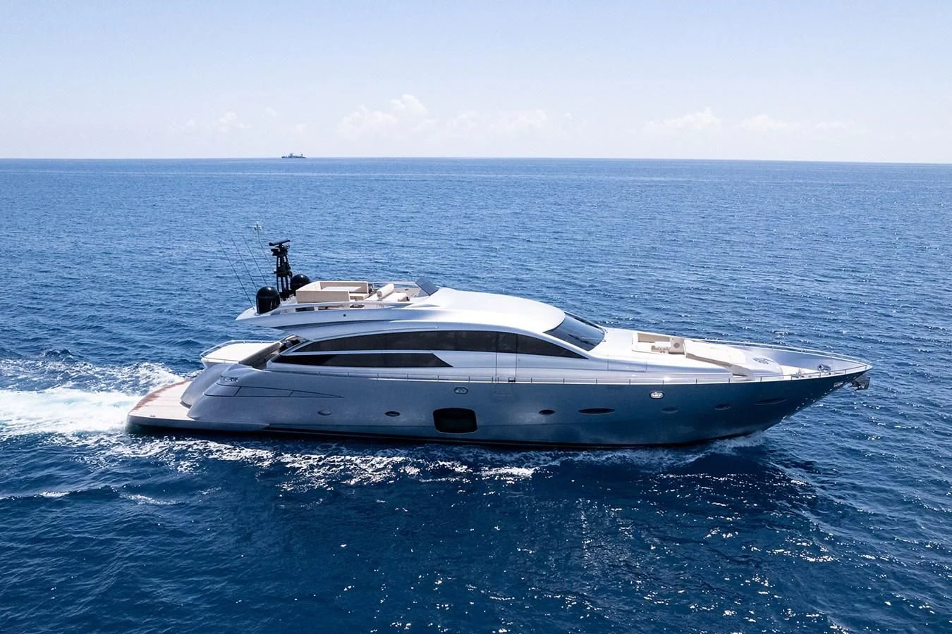 a white yacht in the water aboard CLAIMS TO FAME Yacht for Sale