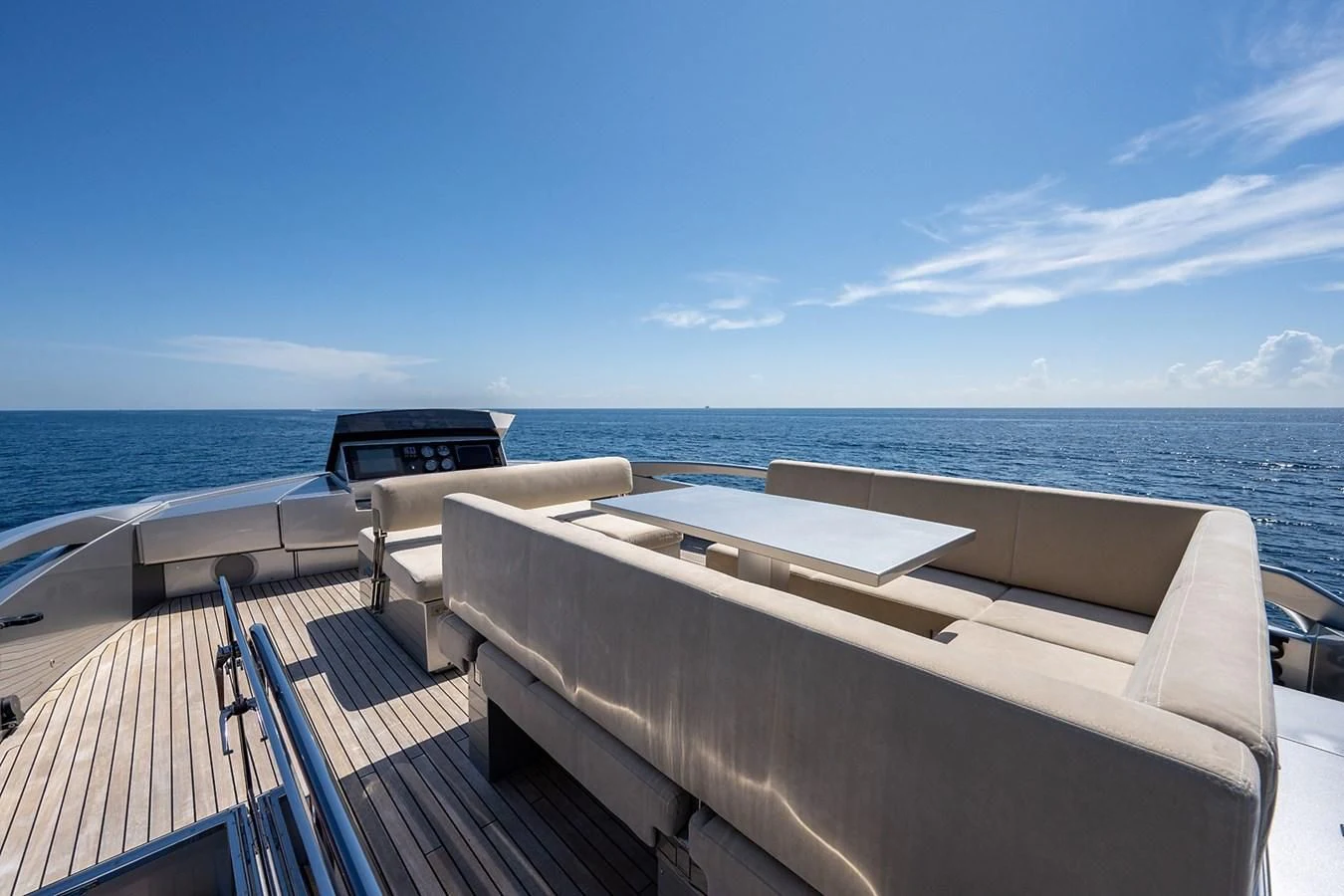 a boat on a deck overlooking the ocean aboard CLAIMS TO FAME Yacht for Sale