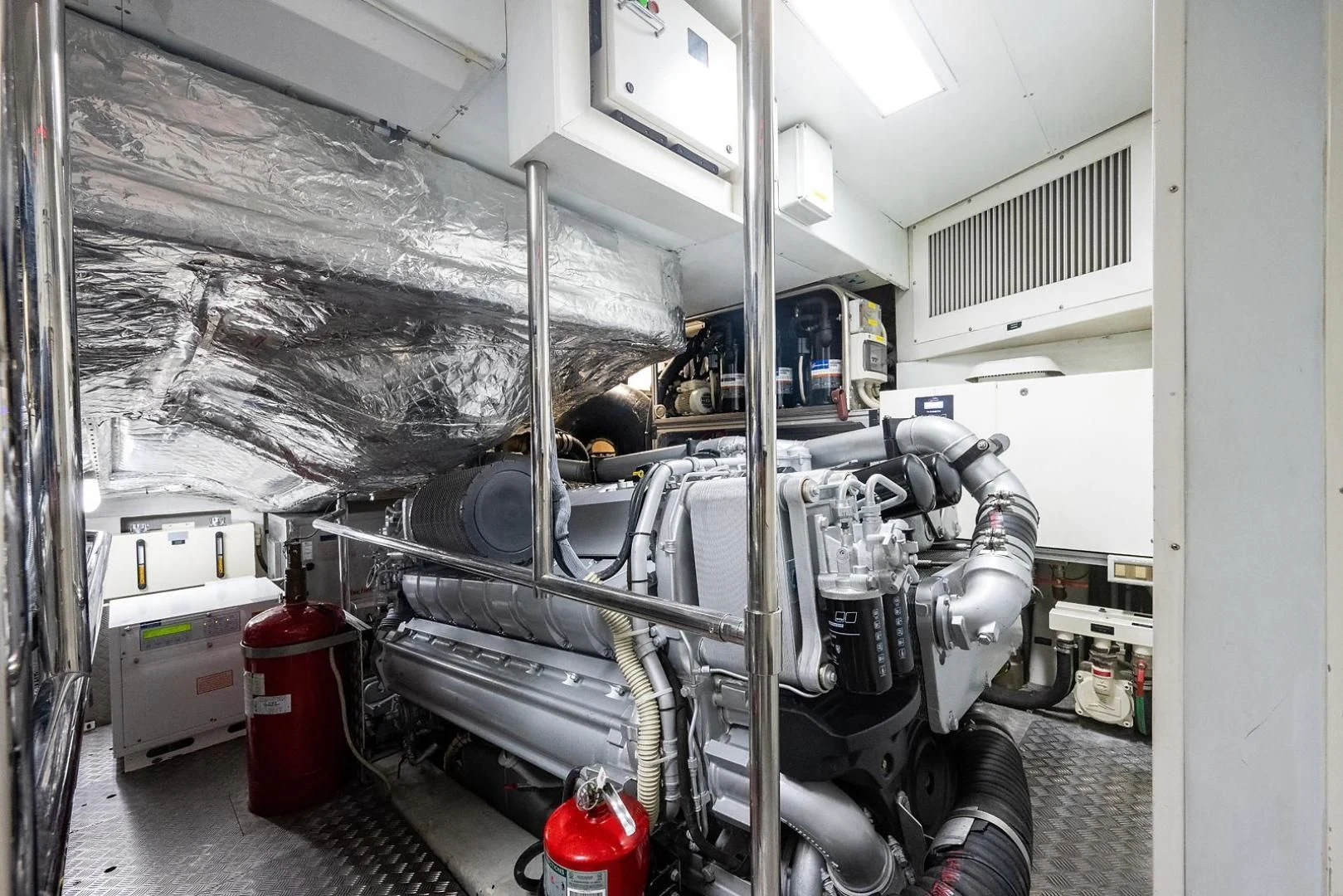 a large machine in a room aboard CLAIMS TO FAME Yacht for Sale