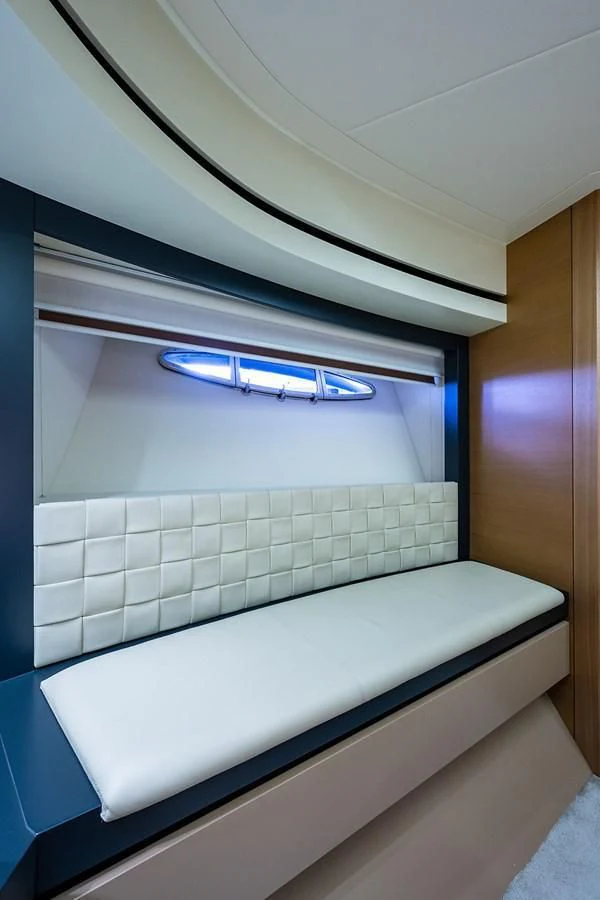 a room with a white tiled wall aboard CLAIMS TO FAME Yacht for Sale