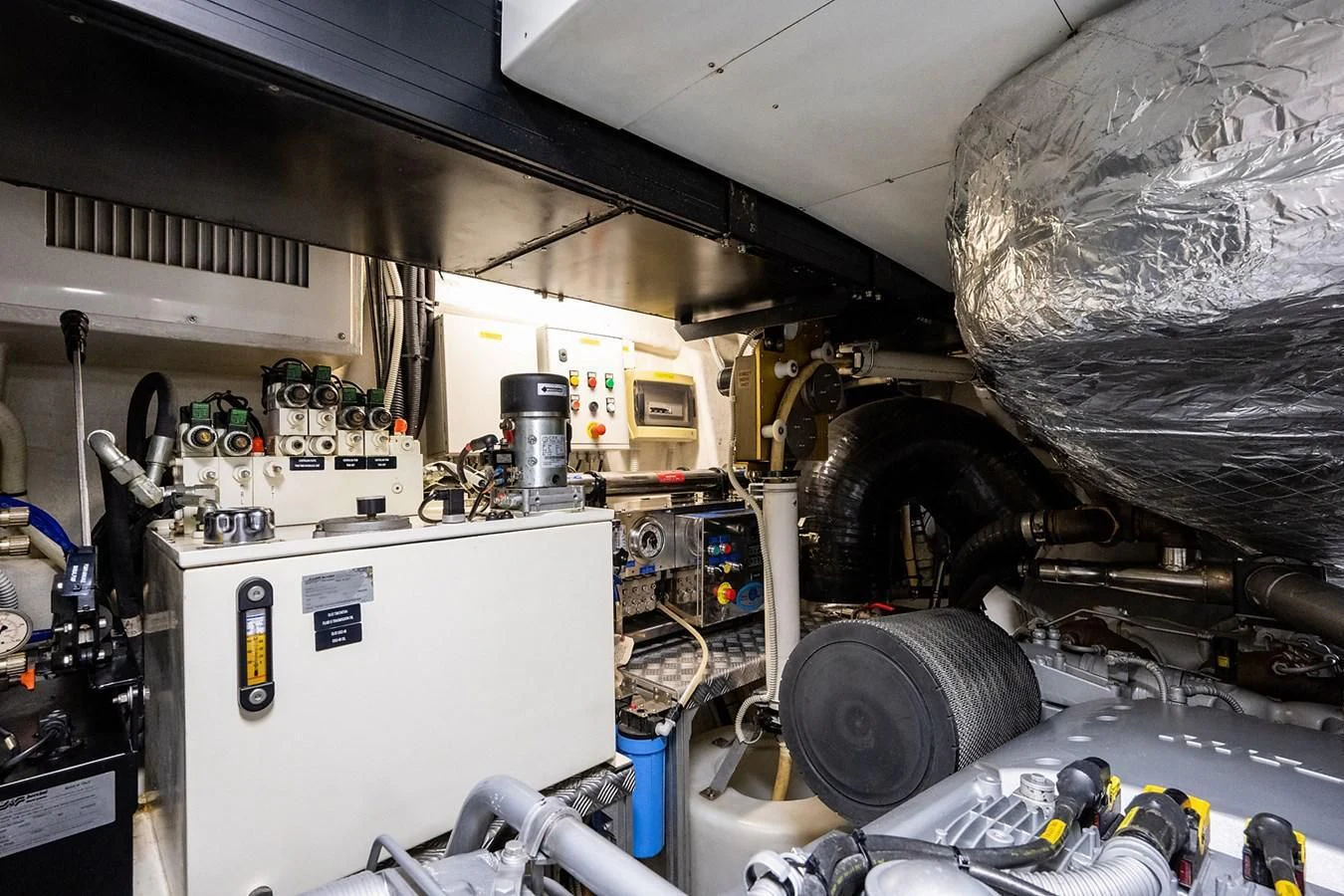 a large machine with a large piece of metal in it aboard CLAIMS TO FAME Yacht for Sale