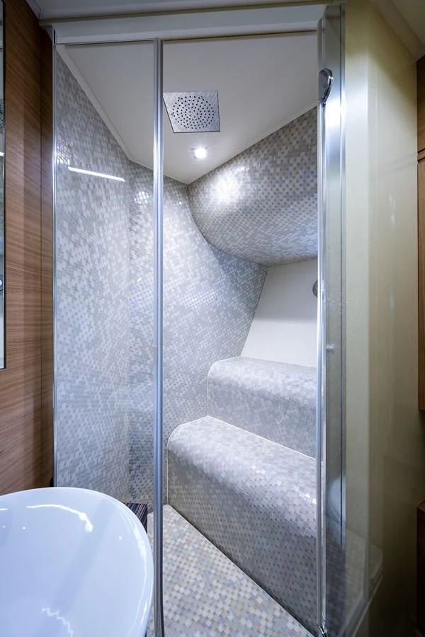 a shower unit with a glass door aboard CLAIMS TO FAME Yacht for Sale